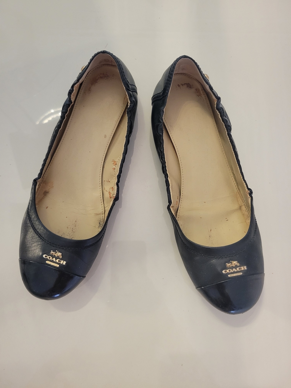 COACH Black Leather Cap-Toe Ballet Flats with Gold Logo